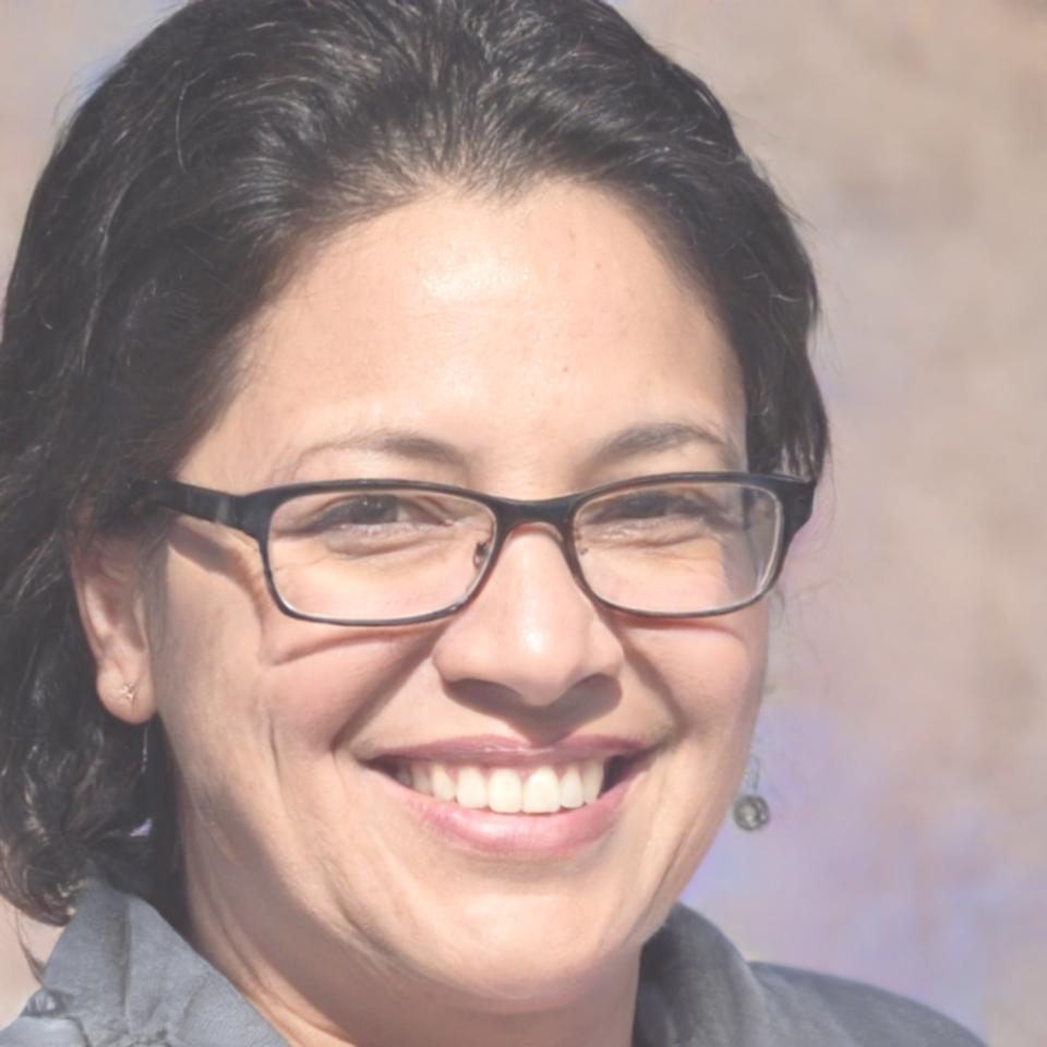 Senior financial analyst reviewing industry reports